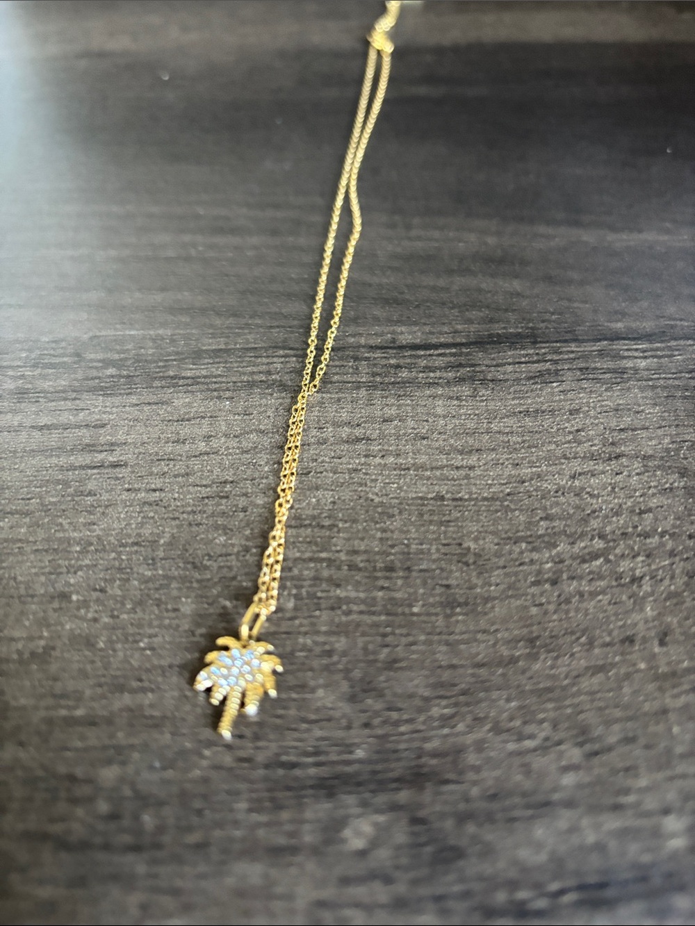 Delicate Gold Tone Palm Tree Pendant Necklace with Crystal Details